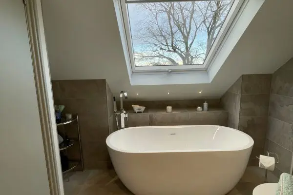 Large loft bathroom with freestanding bath, fitted furniture and walk-in shower_0749 (Large)